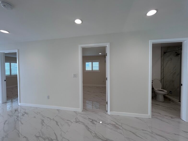 Bedroom 1 (left), bedroom 2 and restroom 2 (middle), restroom 1 (right) - 3241 Prospect Ave