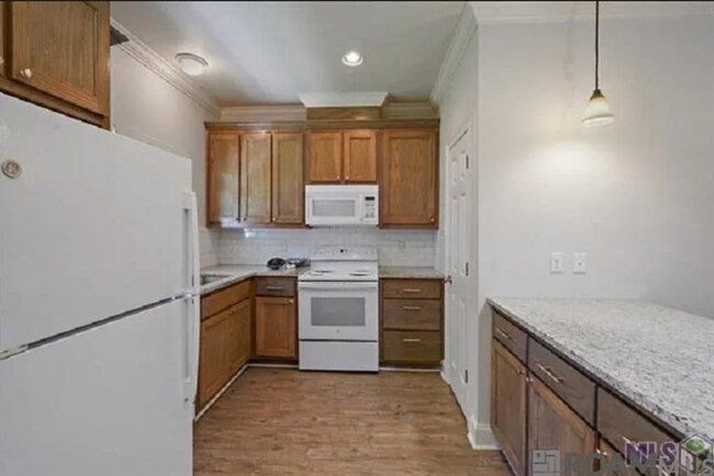 Building Photo - Greenwell Springs 4-plex