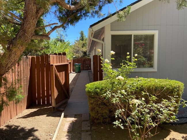 Building Photo - Coming Up Roses - NW Reno 4 Bedroom/3 Car Garage Single Story House