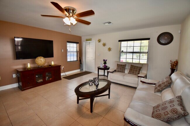 view from kitchen of Liv room and front door - 1473 NE 48th St