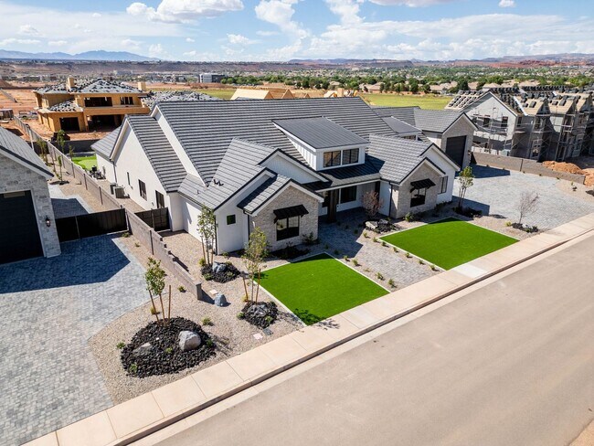 Building Photo - Gorgeous Custom Single Story with RV Garage