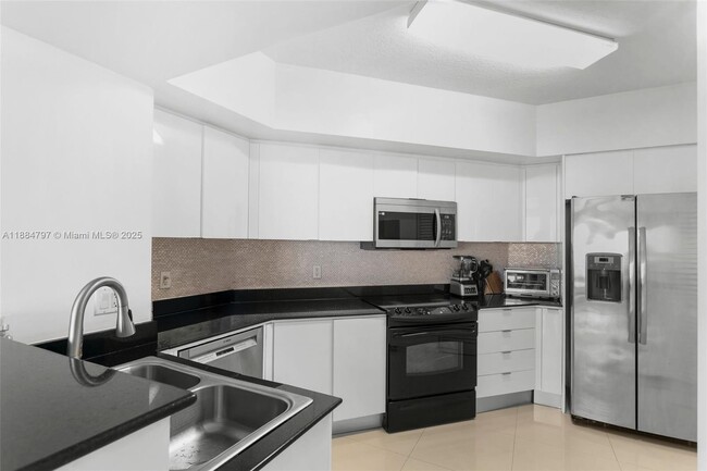 Building Photo - 16699 Collins Ave
