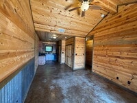 Building Photo - 2 bed 2 bath fourplex. Stained concrete floors. Washer & Dryer hookups in unit.