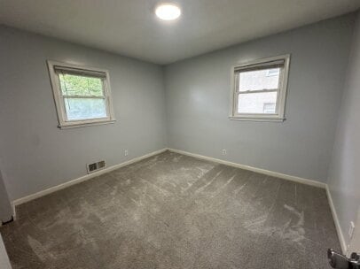 Building Photo - "Charming 2-Bed Hideaway in NE Minneapolis - Spacious 900 Sq. Ft. Comfort!"