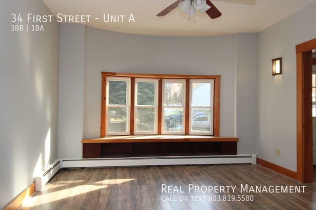 Building Photo - Spacious 3 Bedroom Apartment- Heat Include...