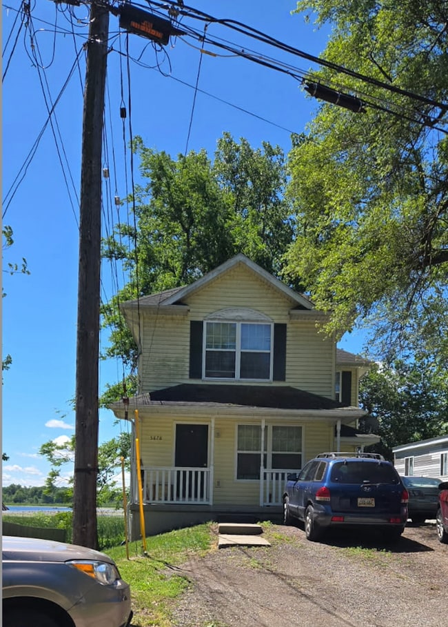 Building Photo - 2-Bedroom Lakefront Duplex with Balcony, Private Backyard & In-Unit Laundry