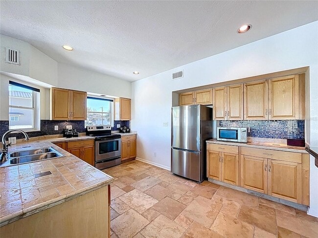 Building Photo - 8485 Blind Pass Dr