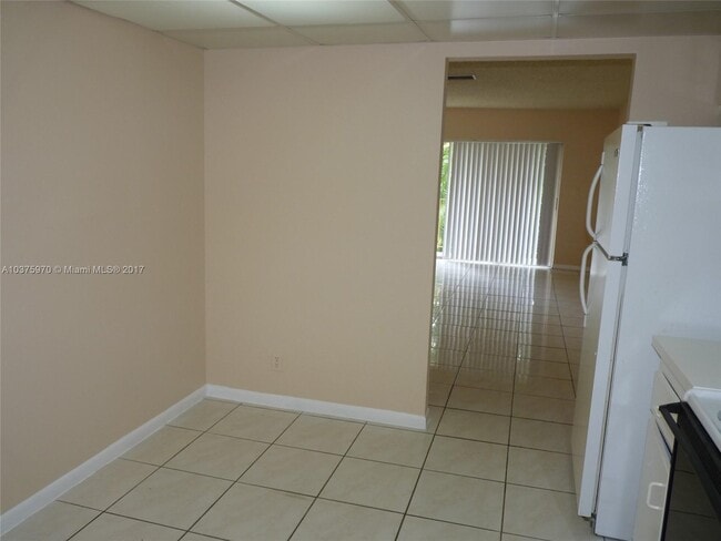Building Photo - 3100 Coral Springs Dr
