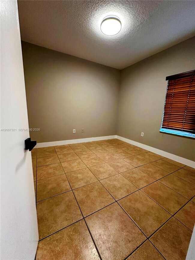 Building Photo - 8445 NW 140th Terrace