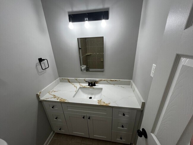Building Photo - Must See the Sunroom off the Primary Bedroom!