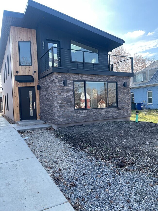 Building Photo - Welcome to this stylish and modern 2-bedro...