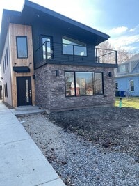 Building Photo - Welcome to this stylish and modern 2-bedro...