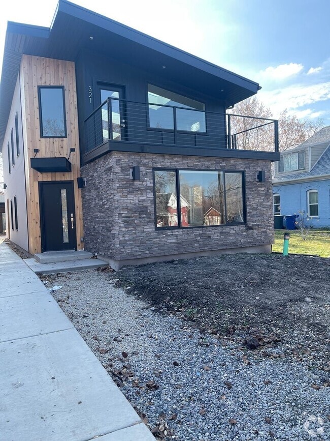 Building Photo - Welcome to this stylish and modern 2-bedro...