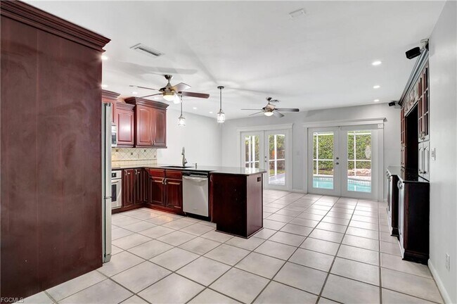 Building Photo - 42nd Terrace Southwest, Naples, FL 34116 -...