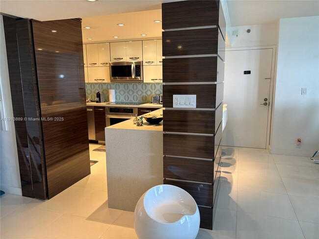 Building Photo - 9511 Collins Ave