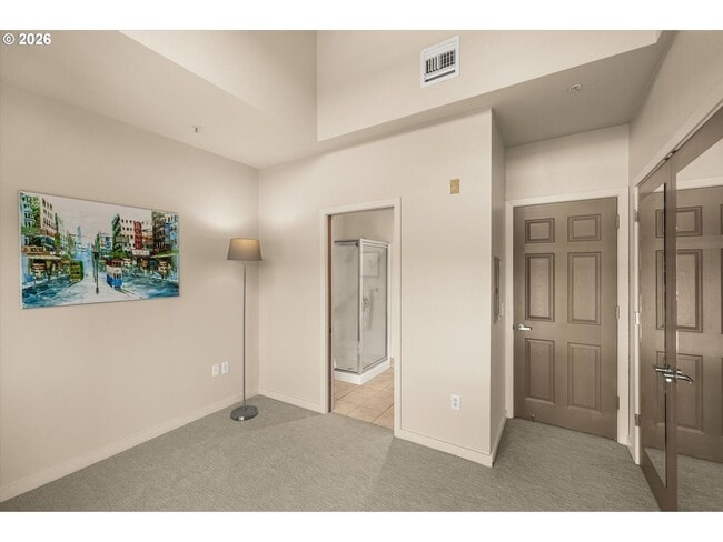 Building Photo - Main Street Living with Granite Kitchen, Gas Fireplace, and MAX Line Access