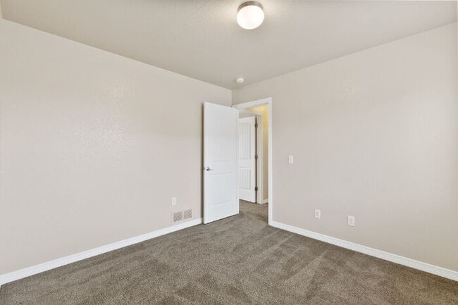 Building Photo - Spacious 3-Bedroom Home with Central A/C Near Fort Carson & Peterson