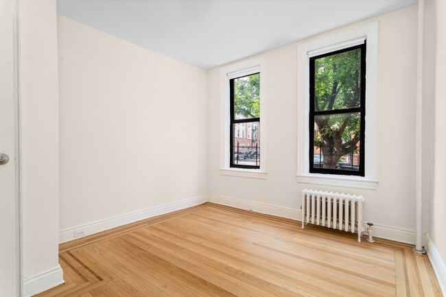 Building Photo - 52-25 Skillman Ave