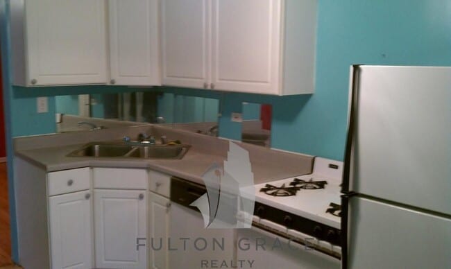 Building Photo - 5943 N Magnolia Ave