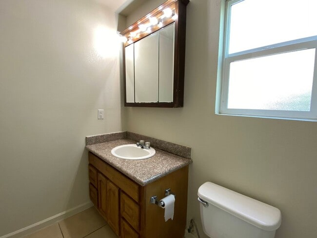 Building Photo - Spacious Duplex with Two Bedrooms, Two Bathrooms and Two Car Garage