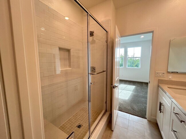 Building Photo - Gorgeous, 3 level townhome, featuring 2 car garage central Air, and in Unit laundry.
