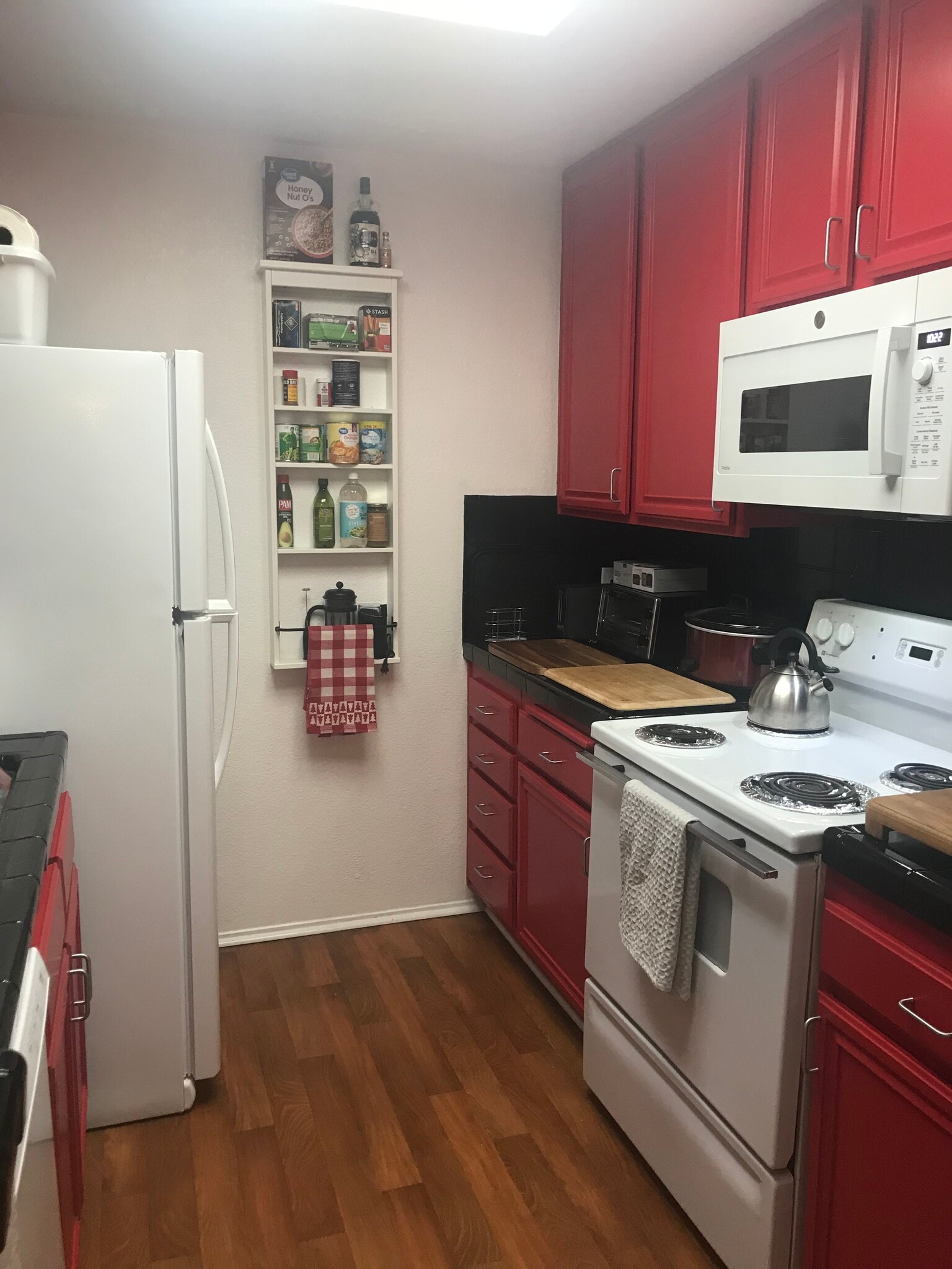 New fridge, dishwasher, disposal, microwave in efficient Pullman style kitchen - 850 State St