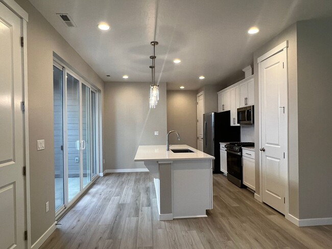 Building Photo - Brand new 3 bed 2.5 bath townhome in Stars...