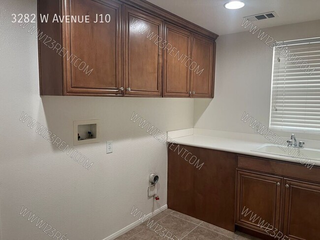 Building Photo - 3282 W Ave J 10