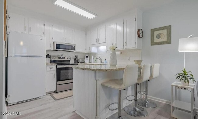 Building Photo - 17462 Front Beach Rd