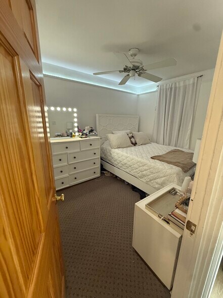 Bedroom 1 view in. Getting new floors, walls, lighting and fan. - 9 Green St