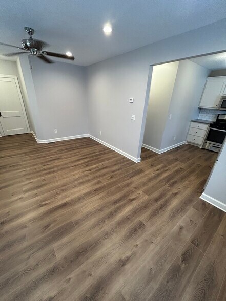 Living room all new vinyl plank flooring - 950 29th Ave NE