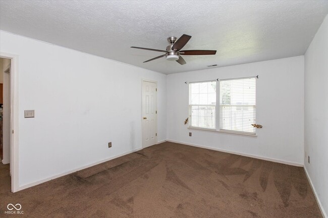 Building Photo - 7136 Pluto Dr
