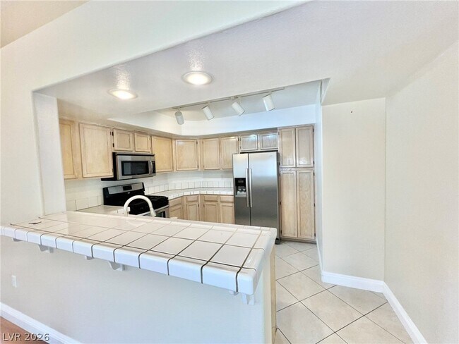 Building Photo - 7950 W Flamingo Rd