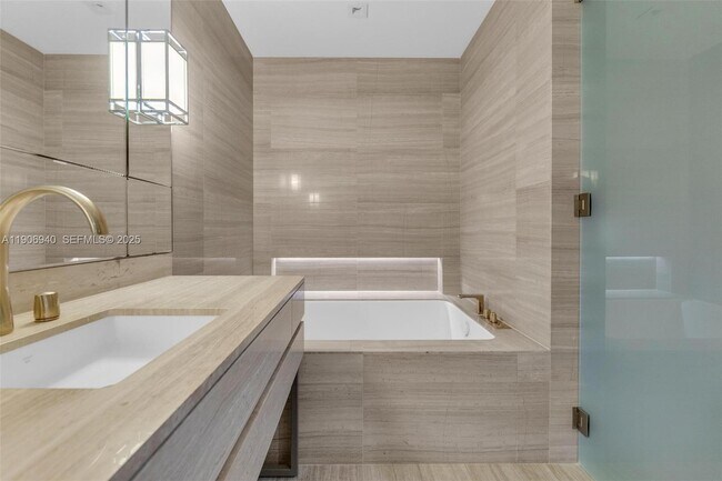 Building Photo - 18975 Collins Ave