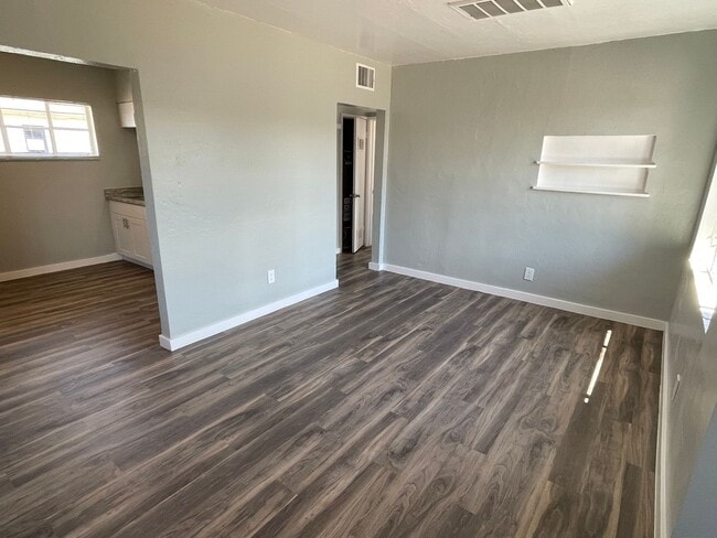 Building Photo - OPEN HOUSE! Remodeled Two Bedroom, End Unit with A/C and Large Fenced Yard