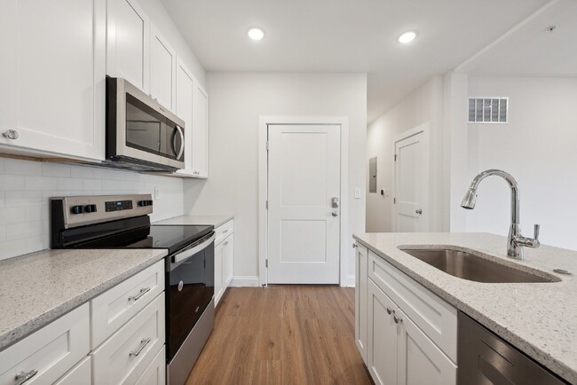 Building Photo - "NEW CONSTRUCTION Urban Living: Spacious 4...