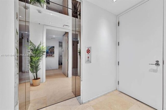 Building Photo - 15701 Collins Ave