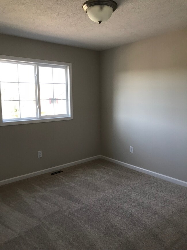 Building Photo - Large townhouse in Okemos - available now