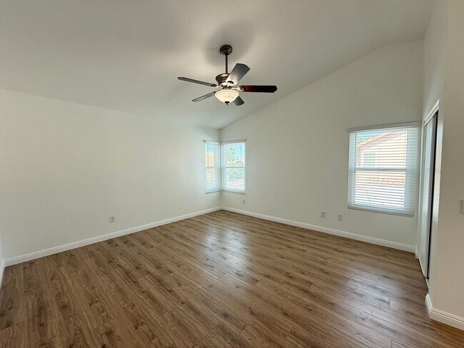 Building Photo - Corner Lot Beauty with Open Living, Guest Suite Down & Expansive Backyard
