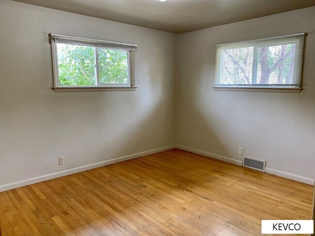 Building Photo - Massive Three Bedroom Home with Yard!