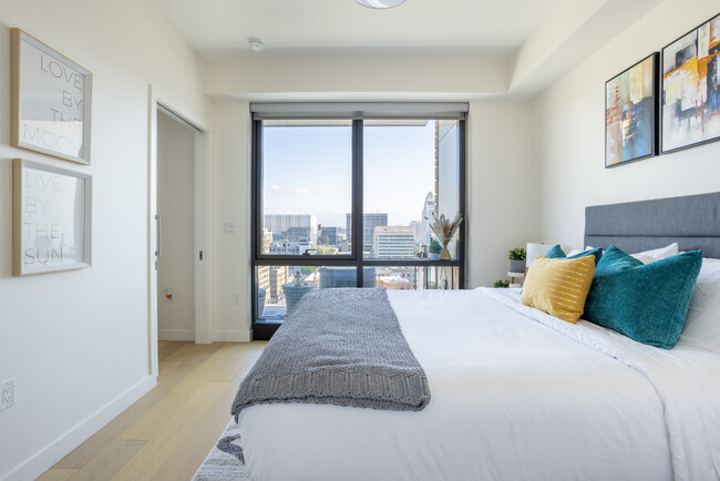 Stylish Bedroom with floor to ceiling window and iconic view. City Hall view from bedroom. - 400 S Broadway