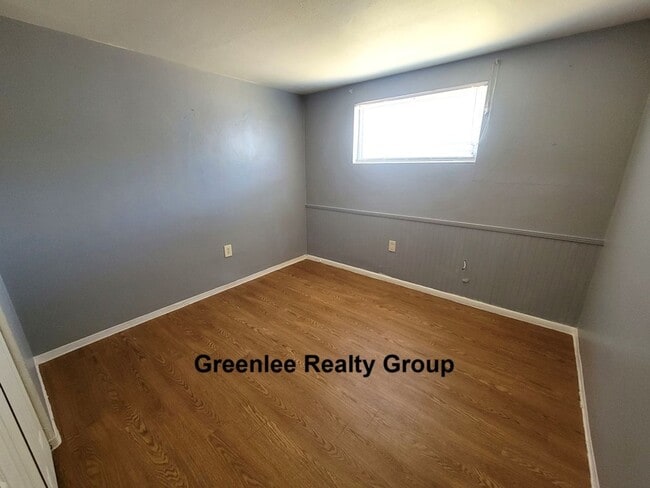 Building Photo - Cozy 2 Bed/1 Bath Duplex Apt with a Carport and Large Fenced Back Yard!