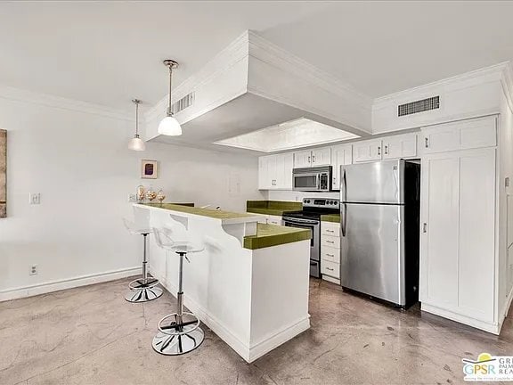 Building Photo - 1655 E Palm Canyon Dr