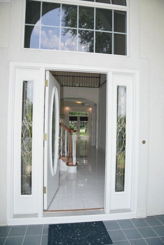 Building Photo - Executive Lakeview Home in Gated Windward Community!