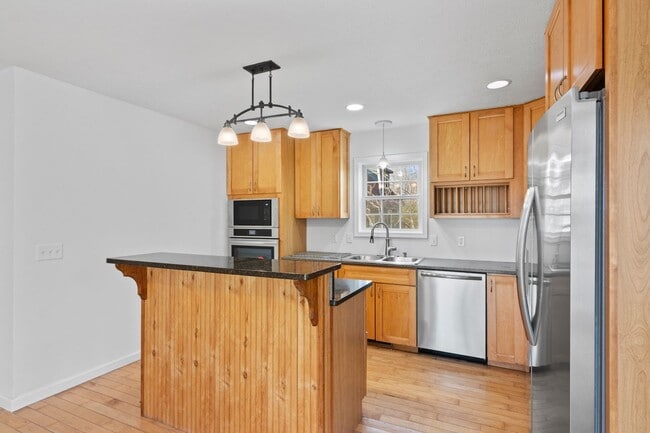 Building Photo - Charming 3+ Bedroom Cape Cod with Water View – Between Traverse City & Suttons Bay