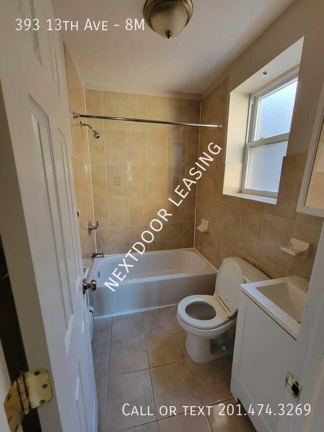 Building Photo - 393 13th Ave