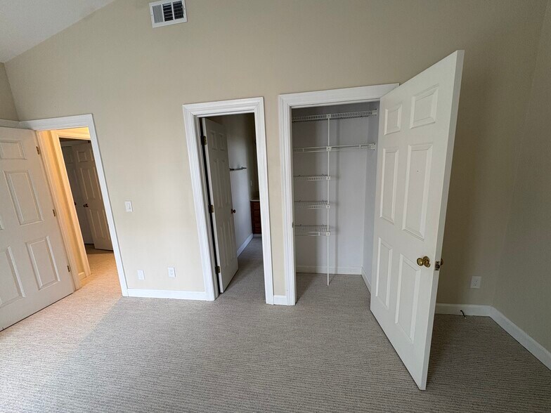 2 of 2 closets in primary bedroom - 2032 Graybar Ln