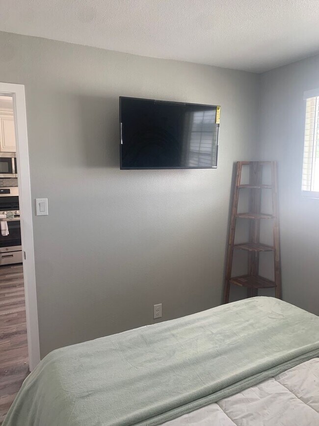 Building Photo - Furnished, Upstairs Apartment with 2 bedrooms and 1 bathroom. Utilities Included!!