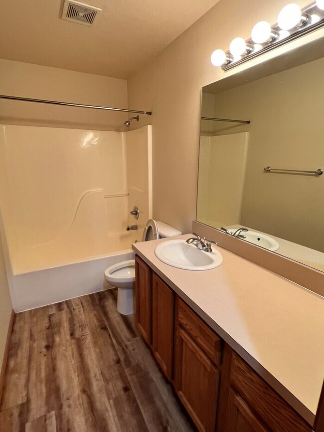 Building Photo - Beautiful Home with LVP Flooring, W/D, Garage, Back Yard, and MORE!