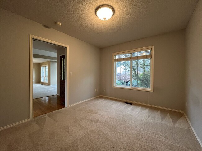 Building Photo - Elegant Home Offering Open Living Spaces, Spacious Primary Suite, and Nature-Inspired Yard